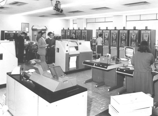 Machine room showing tape readers, card reader, Anelex printer and magnetic tape decks