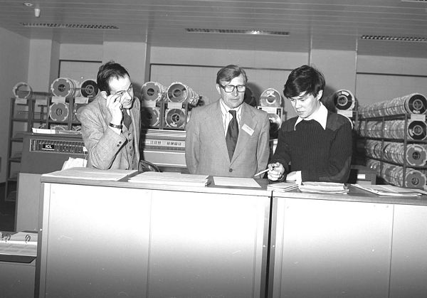 Mike Chiu demonstrates the new Grants system to Geoffrey Allan, Chairman of SRC, May 1978