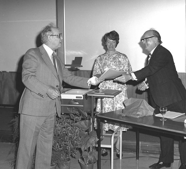 Harry Hurst makes Presentation to Bill Walkinshaw with Bill's secretary Audrey Foster looking on, August 1979