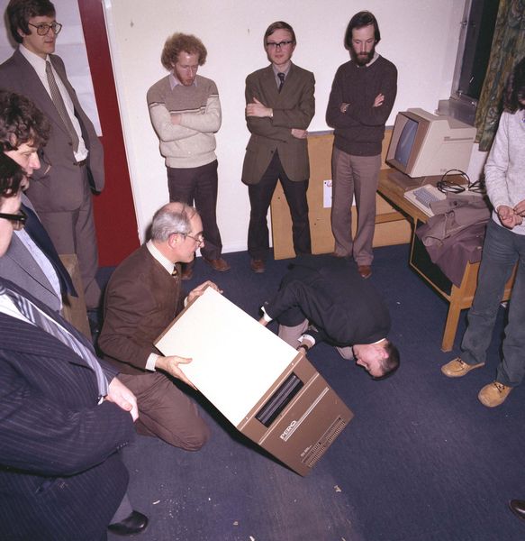 Charlie Portman and Bob Hopgood inspect the damage, Roger Vinnicombe, Colin Prosser, David Duce and Bill Sharpe look on