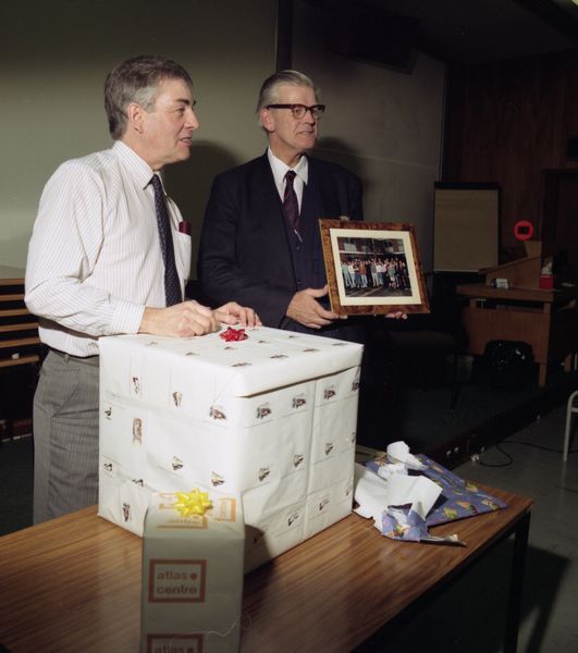 Brian Davies gives photograph to Gary Williams