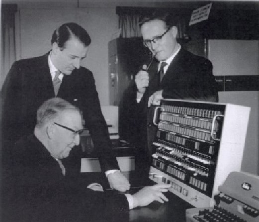 Sir John
Cockcroft pressing a button on the ATLAS console with Sebastian de Ferranti and Prof. Tom Kilburn at his side